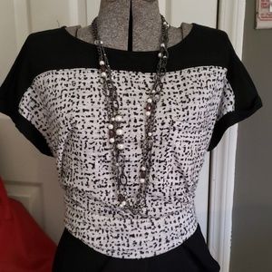 Dressy work to play tee